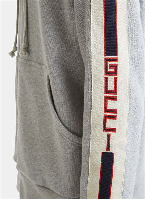 hooded zip-up sweatshirt with gucci stripe fake|are gucci hoodies genuine.